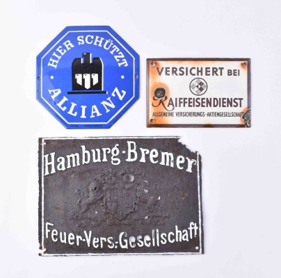 3 old advertising signs