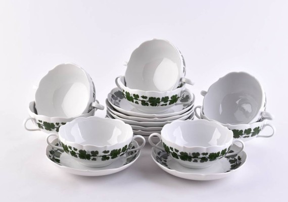 8 soup cups with saucers