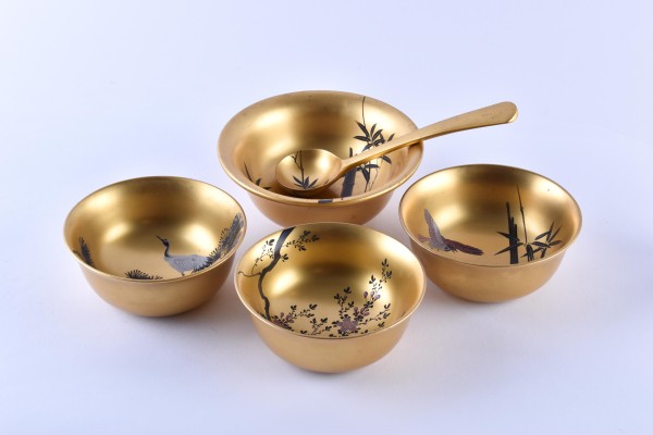 A group of lacquer bowls and spoons Japan,