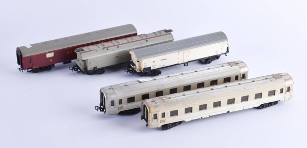 A group of Piko passenger and goods wagons